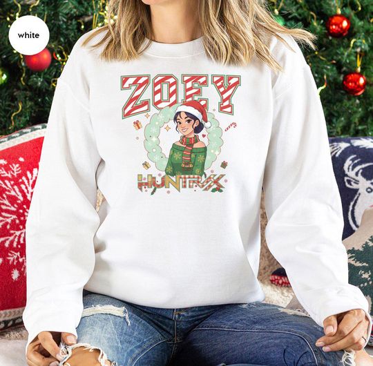 Discover Zoey Huntrx Christmas Sweatshirt, Festive Holiday Apparel with Santa Hat and Candy Cane, Personalized Name Gift for Holiday Enthusiasts
