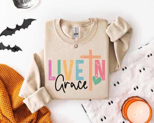 Discover Faithful Living Sweatshirt for Christians with Cross Heart Design, Inspirational Grace Message in Pastel Colors