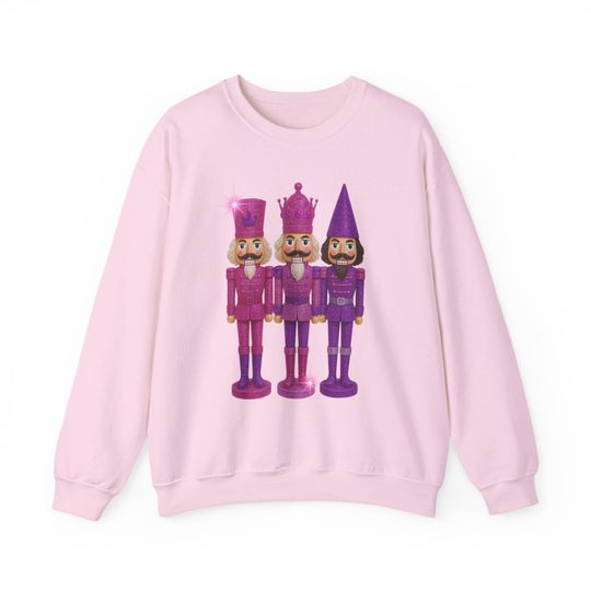 Discover Purple Pink Glam Nutcracker Trio Sweatshirt with Holiday Nutcracker Illustration