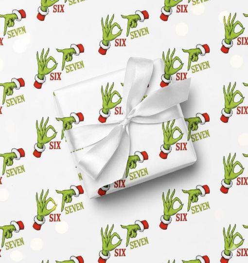 Discover Funny funny character Hand '6 7' Meme Christmas Wrapping Paper