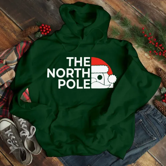 Discover The North Pole Santa Claus Christmas Hoodie Lapland Gift