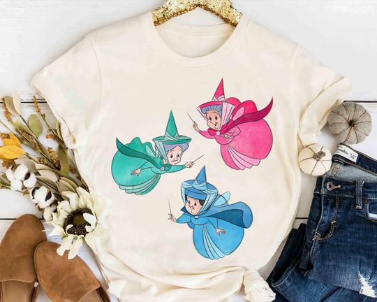 Discover Disney Sleeping Beauty Flora Fauna T-Shirt, Merryweather Make It Blue Pink Green Tee, Magic Kingdom 2025 Trip