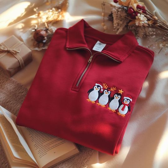 Discover Embroidered Christmas Penguin Quarter Zip Sweatshirt