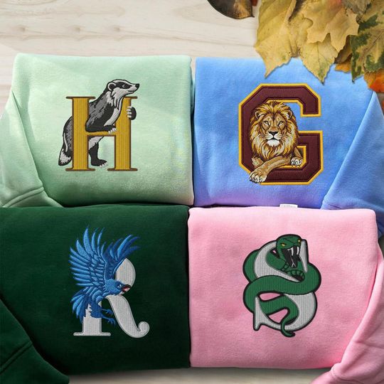 Discover Embroidered Wizard School Logo House Sweatshirt, Embroidered Wizard Sweatshirt, Book Lover Gift, Magic Shirt, Movie Sweater ESS805-809