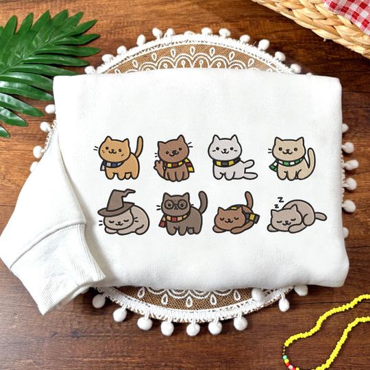 Discover Embroidered Wizard Cats Sweatshirt, HP Cat Shirt, Magical Cat Tee, Cozy Fantasy Book Lover, Cute Wizard Cat Gift For Her Him ESH5807