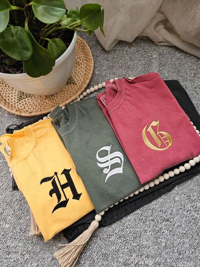 Discover Embroidered Wizard School, HP house shirts and sweatshirts! Read description before ordering!