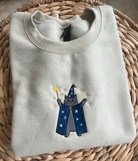 Discover Embroidered Black Cat Wizard Crewneck - Halloween Sweatshirt - Men's Women's Unisex - Fall Cozy