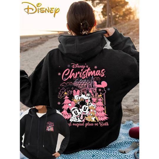 Discover Disney Women's Christmas Magic Hooded Sweater. Zip-up hoodie featuring Mickey, Minnie, Donald Duck, and Goofy. Autumn/Winter