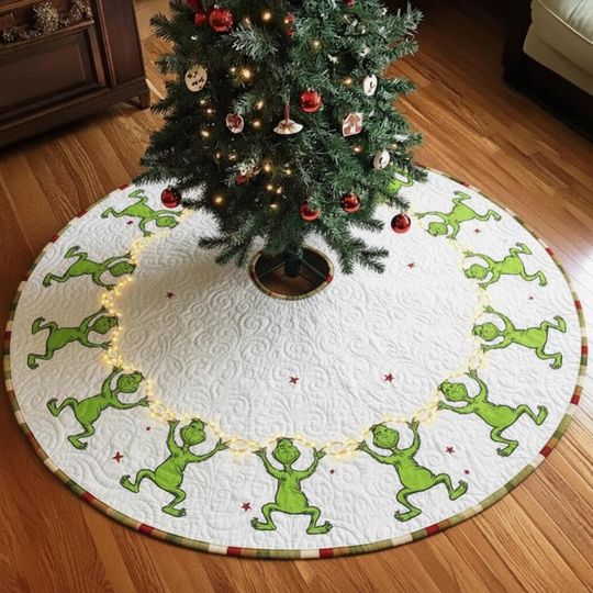 Discover Funny Green Character Christmas Lights Tree Skirt, Funny Green Character Holding Fairy Lights, Quilted White Holiday Decor