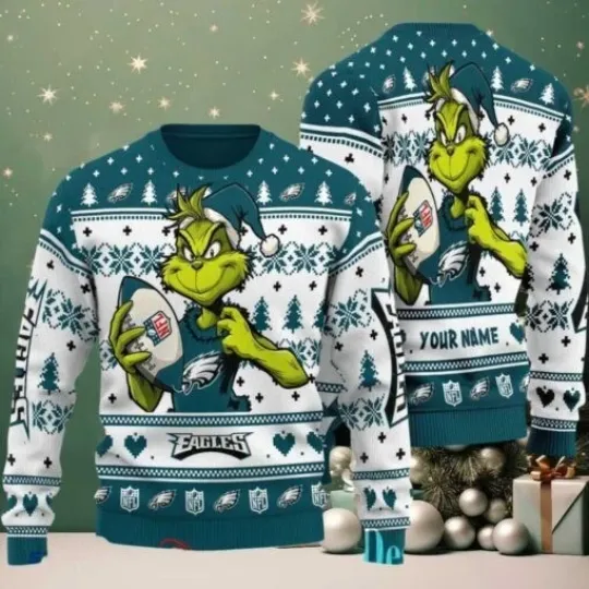 Discover Eagles funny character Stole With Ball Grin Football Team Ugly Christmas Sweater
