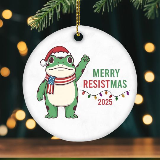 Discover Merry Resistmas 2025 Ceramic Ornament  Funny Political Frog Christmas Tree Decor  Holiday Gift for Activists, Protesters or Free Thinkers