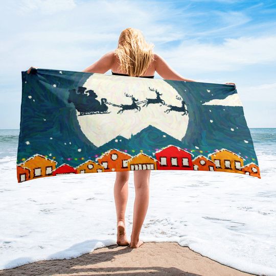 Discover Tropical Christmas Beach Towel with Village Santa and Reindeer Print