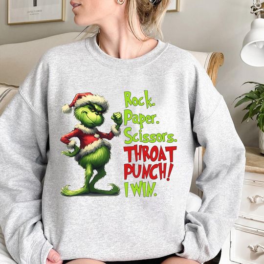 Discover Funny Character Rock Paper Scissors Throat Punch Sweatshirt, Christmas Monster Grin Hoodie, Christmas Movie Funny Xmas Tee