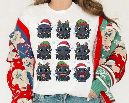 Discover Universal World Toothless Emotions Santa Christmas Lights T-Shirt, Toothless Christmas Shirt, Night Fury Xmas How To Train Your Dragon Tee