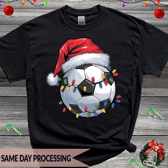 Discover Santa Christmas Soccer T-Shirt with Football Lights Design