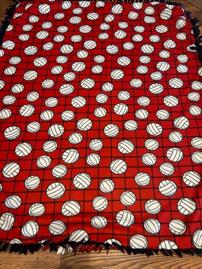 Discover two piece hand tied Volleyball fleece blanket