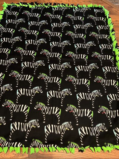 Discover Two-Piece Hand-Tied Zebra Woven Blanket