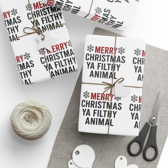Discover Funny Christmas Wrapping Paper: 'Merry Christmas Ya Filthy Animal'