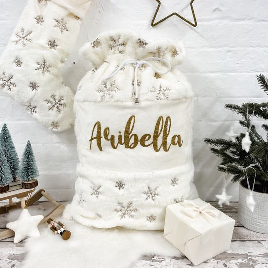 Discover Personalised Name Cream Christmas Santa Sack, Gold Sequin Snowflake Fluffy Gift Sack