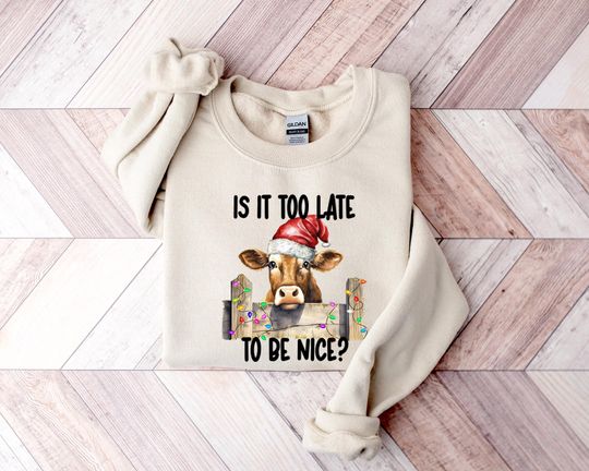 Discover Christmas Cow Sweatshirt: Funny Holiday Shirt (Santa Hat Design)