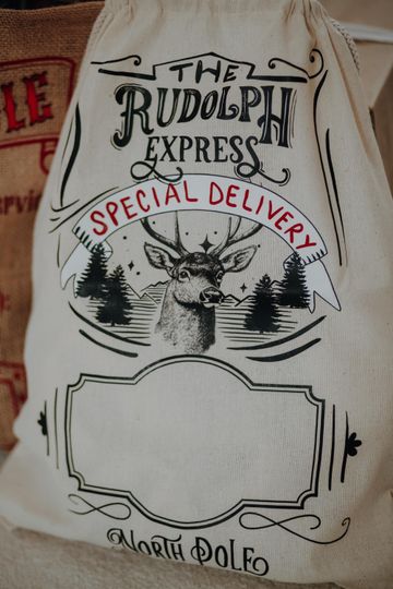 Discover Personalized Rudolph Express Christmas Sack | Reindeer Santa Bag | Custom Name Cotton Gift Sack | Rustic Holiday Decor