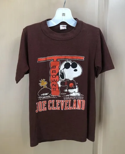 Discover Cleveland team Brown t shirt, cartoon snoopy graphic, team logo lot