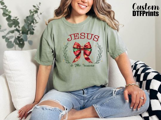 Discover Jesus Is The Reason Comfort Colors Shirt, Christmas Coquette Bow Tee,Christmas Jesus Shirt,Religious Christmas Gift,Christian Christmas Tee