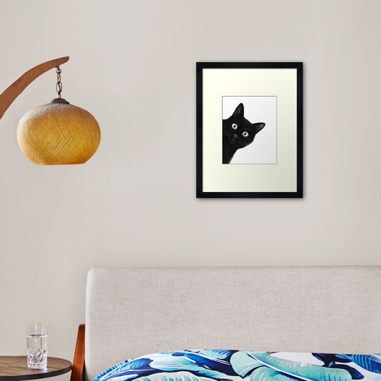 Discover Black cat Framed Art Print