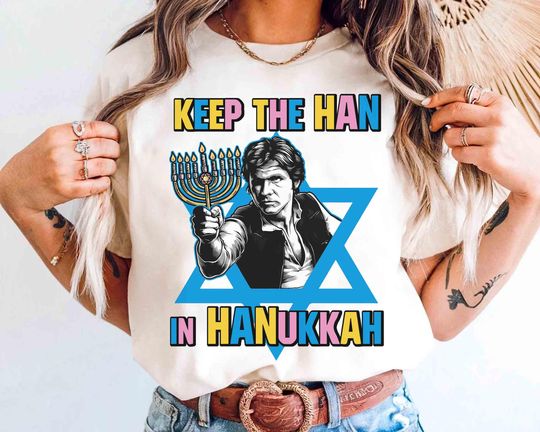 Discover Retro Han Solo Keep The Han In Hanukkah T-shirt, Galaxy's Edge Festival of Lights Party Tee, Hollywood Studios Holiday Family Gift