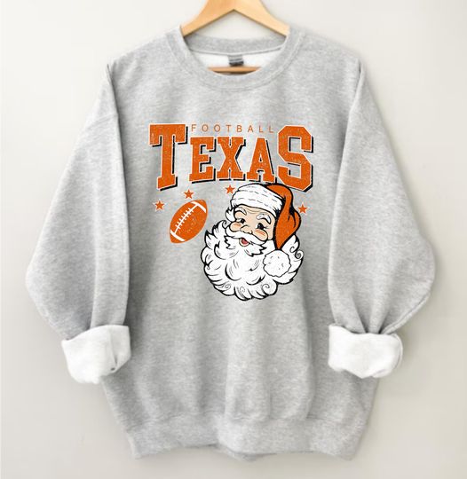 Discover Vintage Texas Football Santa Sweatshirt, Retro Holiday Football Crewneck, Cozy Game Day Christmas Shirt