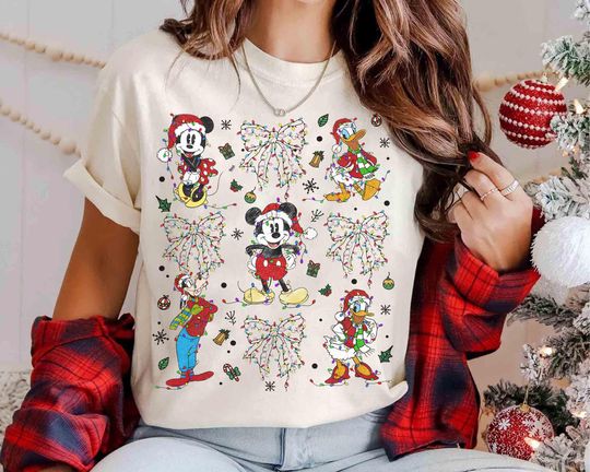 Discover Coquette Bows Mickey and Friends Christmas Lights T-Shirt, Mickey's Very Merry Christmas Party 2025 Tee, WDW Disneyland Family Trip Shirt