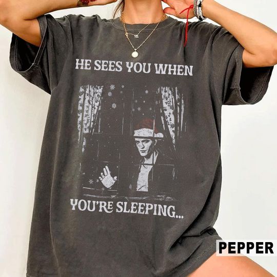 Discover He Sees You When Youre Sleeping Shirt, Funny Christmas Vintage Tee, Comfort Colors Washed Holiday Shirt, Retro Xmas Graphic Tee