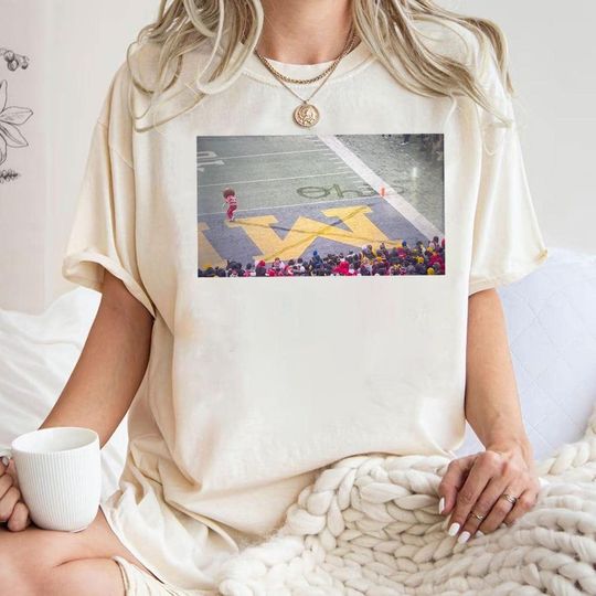 Discover Brutus Ohio State Snow Fan Football Shirt, Ohio vs Michigan brutus crossing out m shirt, Funny Brutus vs Michigan Game Day Tee - Sweatshirt