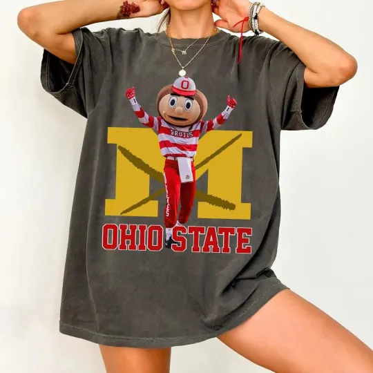 Discover Brutus Ohio State Snow Fan Football T-shirt, Erase the M Ohio State Rivalry Fron