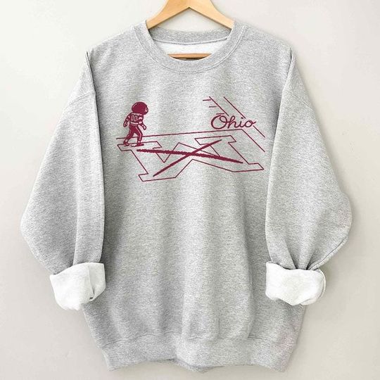 Discover Brutus Ohio State Snow Fan Football Shirt, D ancing Mascot Erase The M Ohio State Rivalry, Funny Brutus vs Michigan Game Day Crewneck