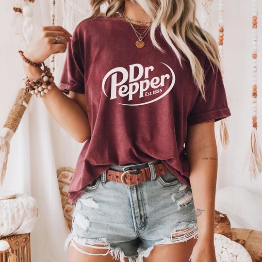Discover Vintage Dr Pepper Graphic Tee: Retro Soda Fan Apparel