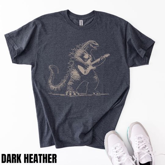Discover god zilla Electric Guitar T-Shirt: Rockstar Dinosaur Graphic Tee