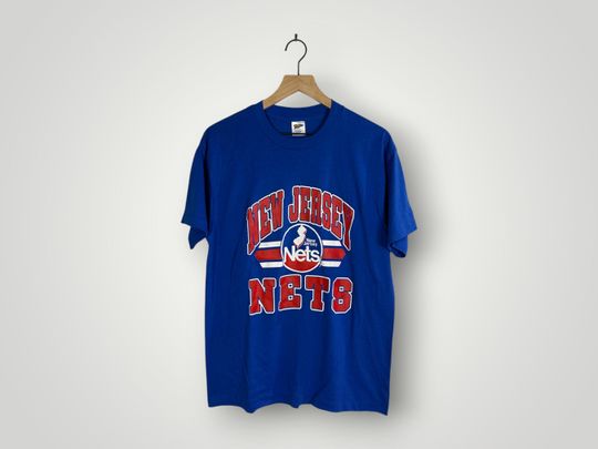 Discover VINTAGE 80's New Jersey Nets Shirt