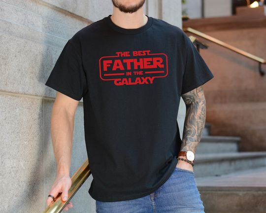 Discover The Best Father in the Galaxy T-Shirt - Funny Father's Day Gift - Unisex Sci-Fi Inspired Tee - Perfect for Dads and Star Lovers