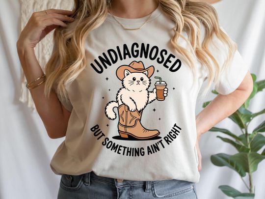 Discover Undiagnosed But Something Ain't Right Shirt, Funny Cowboy Cat Shirt, Sarcastic Shirt, Country Humor Shirt, Mental Health Shirt, Anxiety Tee