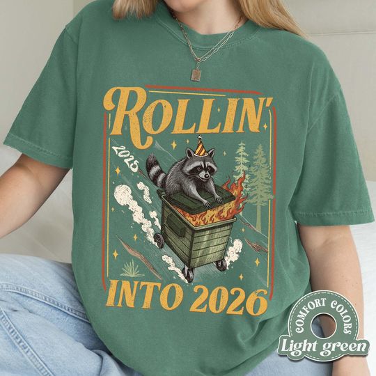Discover Rollin Into 2026 Raccoon T-Shirt, Sarcastic Humor Tee