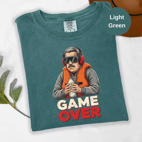 Discover Nicols Maduro Reward T-Shirt  Political Humor & Protest Graphic Tee, Maduro Captured "Game Over" T-Shirt, Jan 3 2026 Historical Edition.
