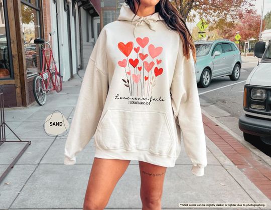 Discover Love Never Fails Hoodie, Christian Valentine's Day Sweatshirt, Valentines Sweatshirt, Girlfriend Gift, Valentine's Day Sweater, Faith Hoodie