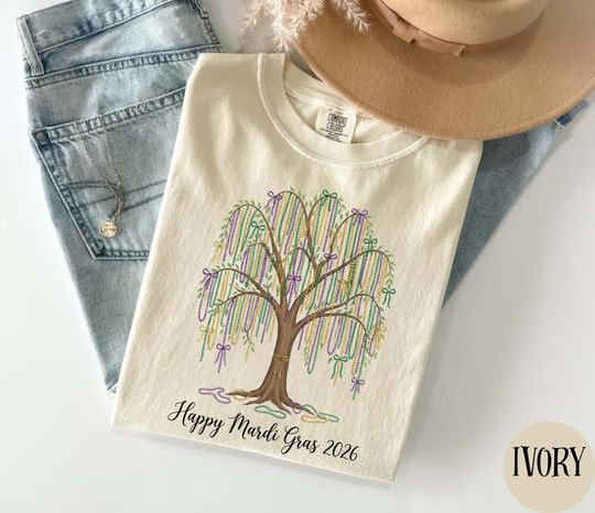 Discover Happy Mardi Gras 2026 T-Shirt, Mardi Gras Tree Shirt with Beads, Festive Carnival Graphic Tee, New Orleans Celebration Shirt, Mardi Gras tee