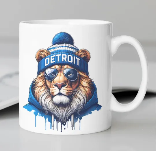 Discover Detroit Lions Mascot coffee mug stating,"DETROIT"