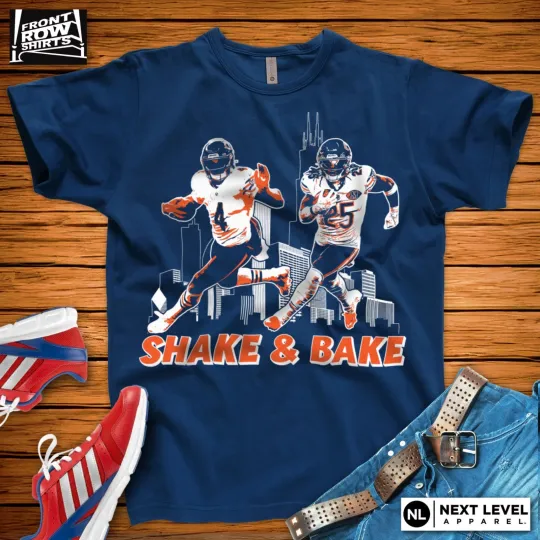 Discover CHICAGO FOOTBALL D'ANDRE SWIFT AND KYLE MONANGAI "SHAKE AND BAKE" T-SHIRT