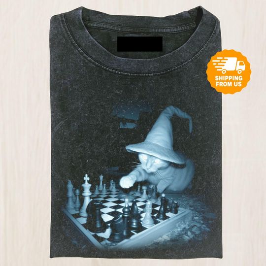 Discover Wizard Cat Playing Chess Shirt, Funny Fantasy Cat Tee, Magical Strategy Meme Shirt, Cat Fans Tee, Gift For Friends