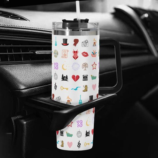 Discover THE ALBUMS Swift 40oz Stainless Steel Tumbler With Black Handle and Straw, Iconic Album Eras Pattern Tumblers