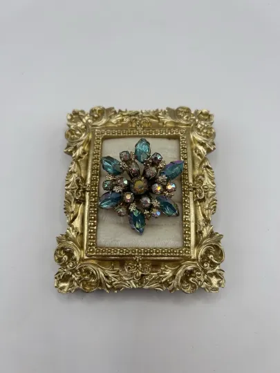 Discover Vintage Blue Aurora Borealis Rhinestone Flower Brooch Gold Tone Pin Snowflake