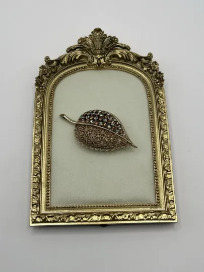 Discover Vintage Karu Arke Brooch Gold Tone Leaf Gray & Amber Rhinestone Signed Austria